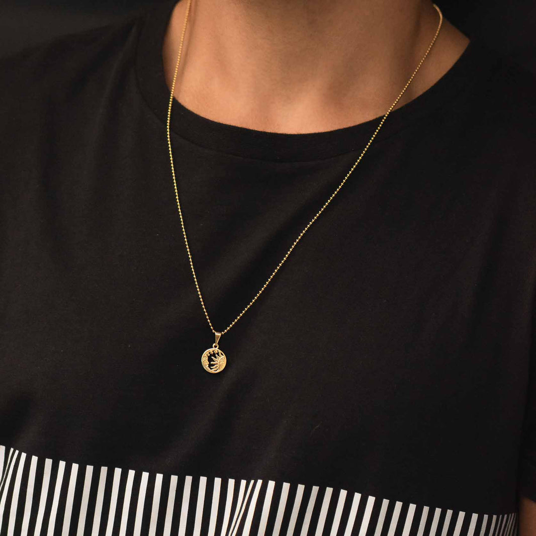 Dije Sol y Luna